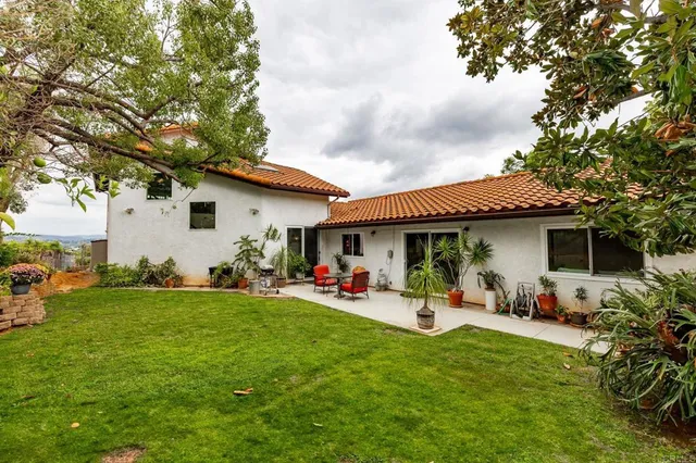 a kitchen with a sink and a stove