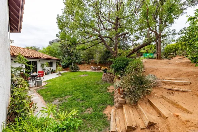 a bathroom with a sink toilet and mirror