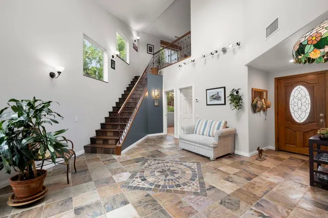 a kitchen with stainless steel appliances granite countertop lots of counter top space