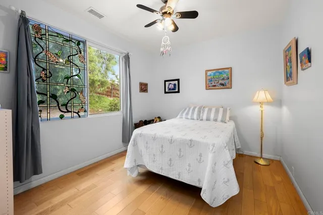 a view of a kitchen with stainless steel appliances lots of counter top space
