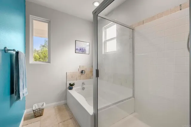 an aerial view of a city with lots of residential buildings