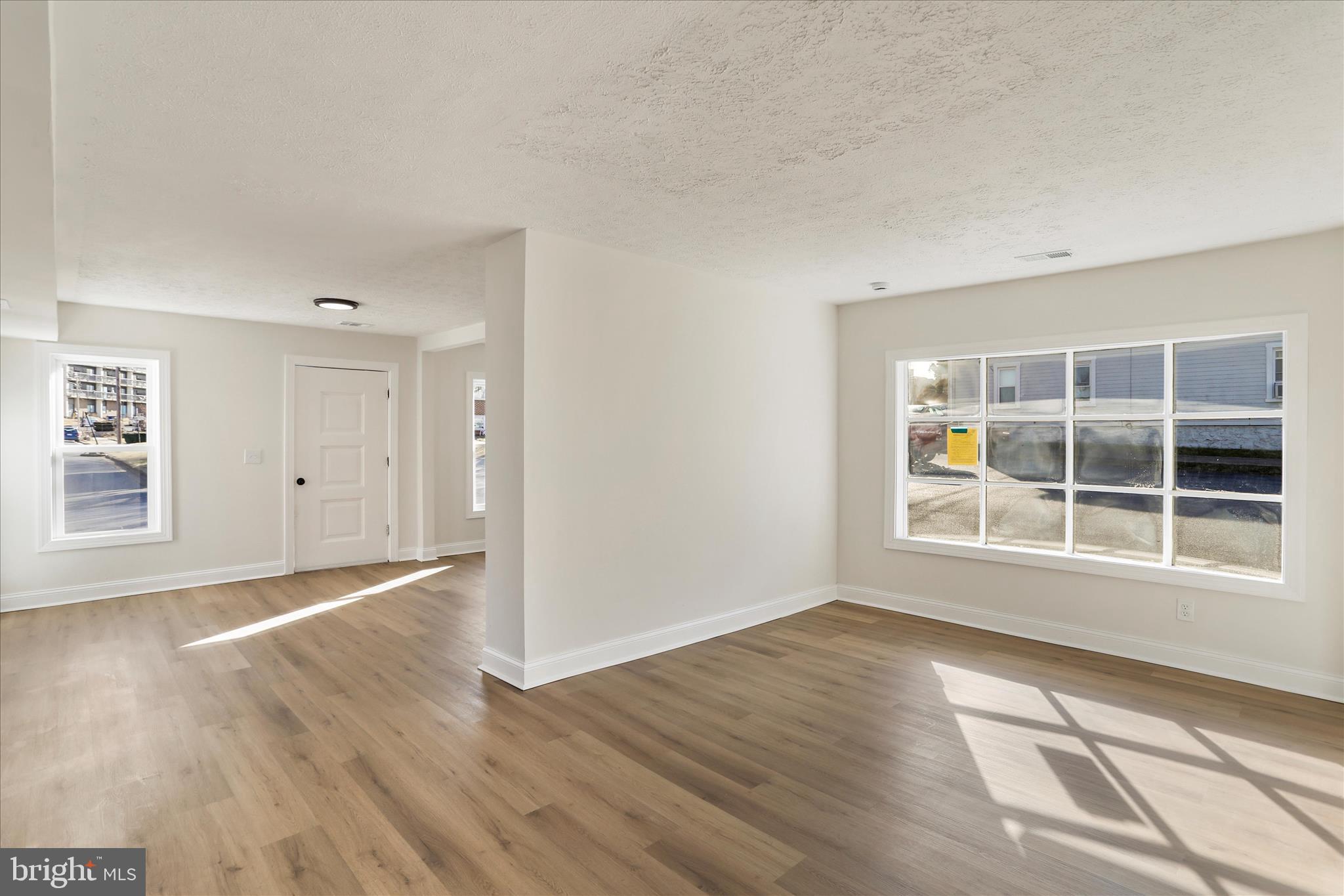 641 South Raleigh Street Martinsburg, WV 25401 - Photo 12 of 34 a view of empty room with a window and wooden floor