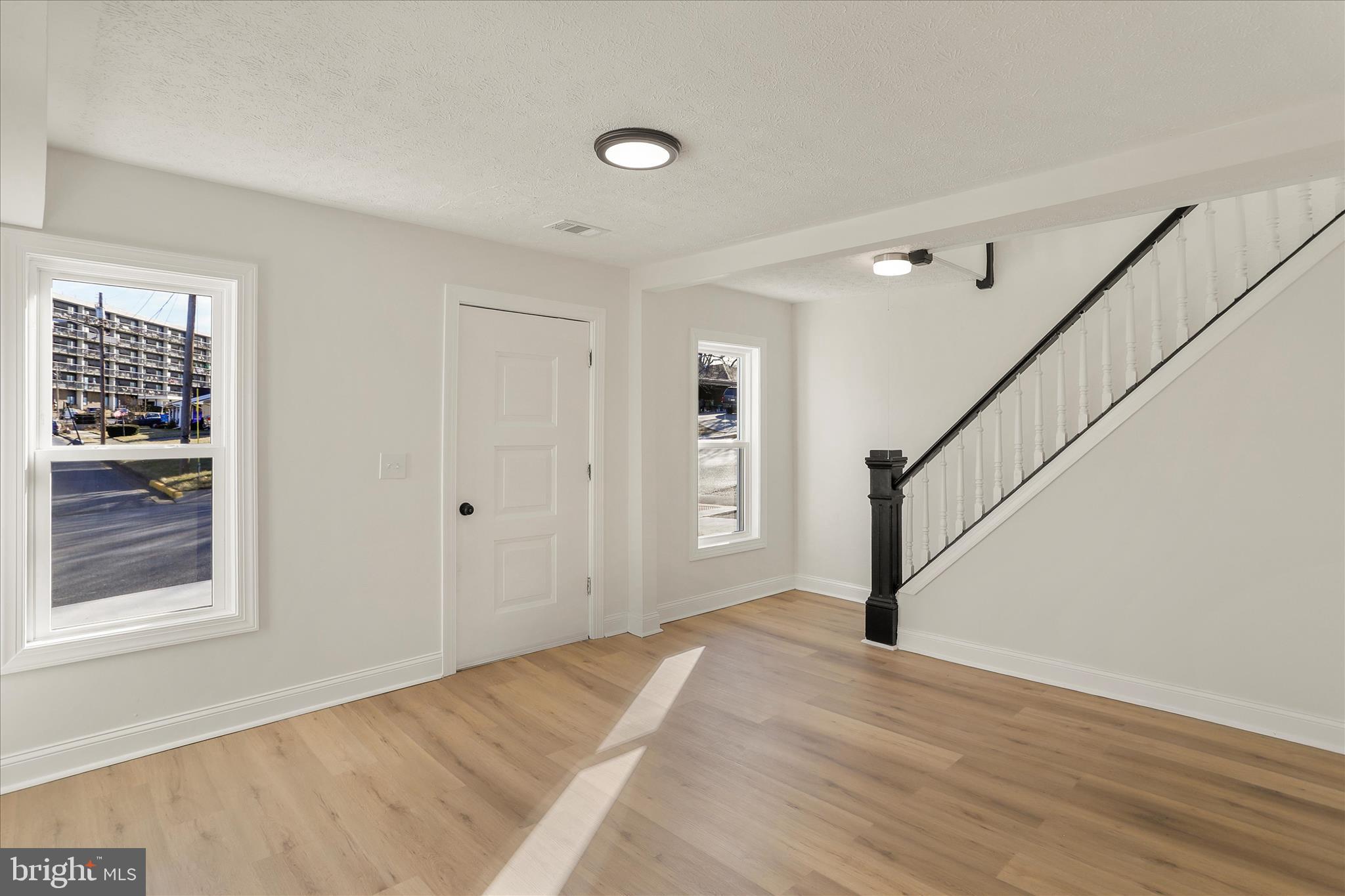 641 South Raleigh Street Martinsburg, WV 25401 - Photo 15 of 34 a view of an entryway with wooden floor and stairs