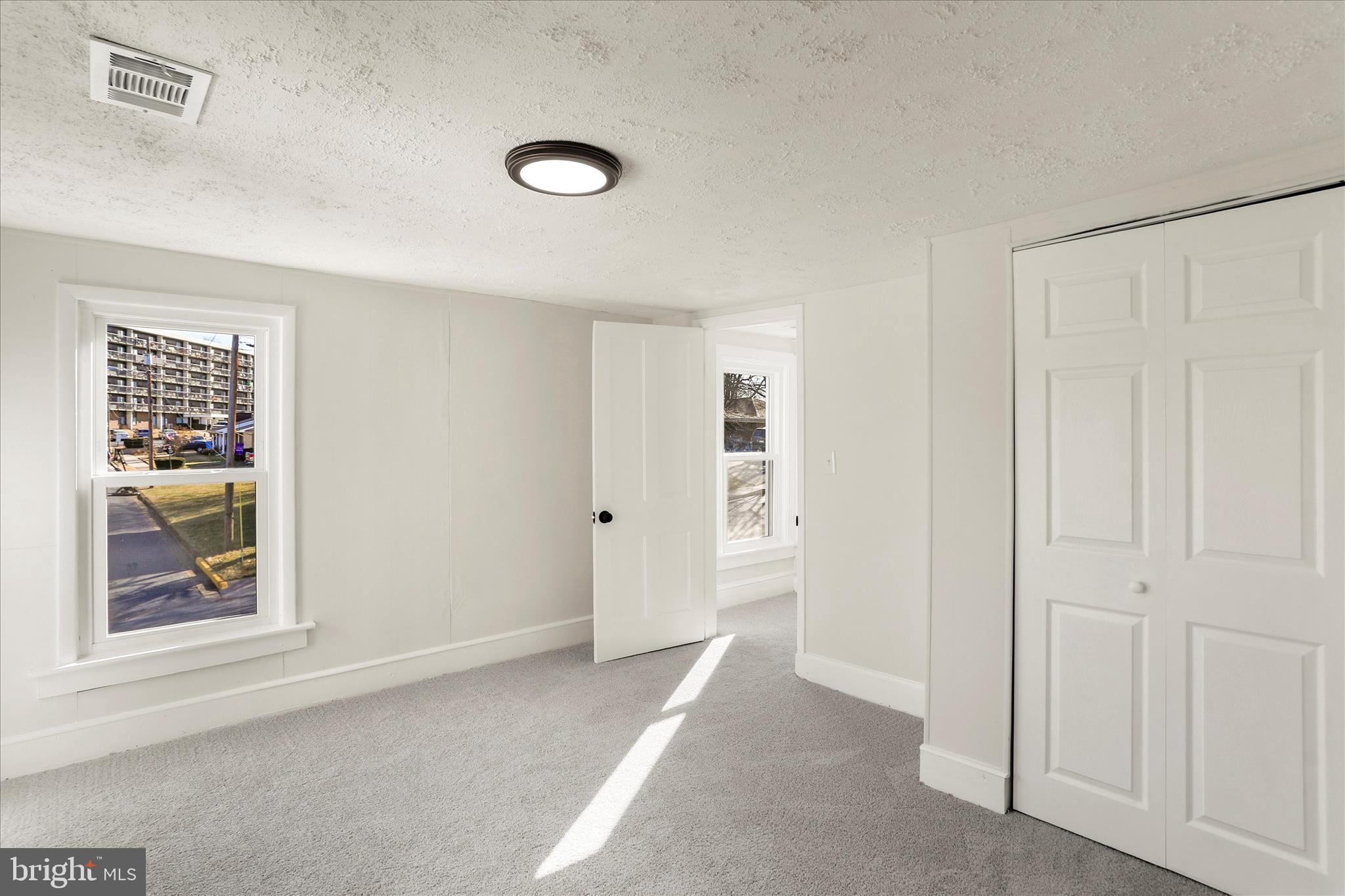 641 South Raleigh Street Martinsburg, WV 25401 - Photo 21 of 34 an empty room with windows