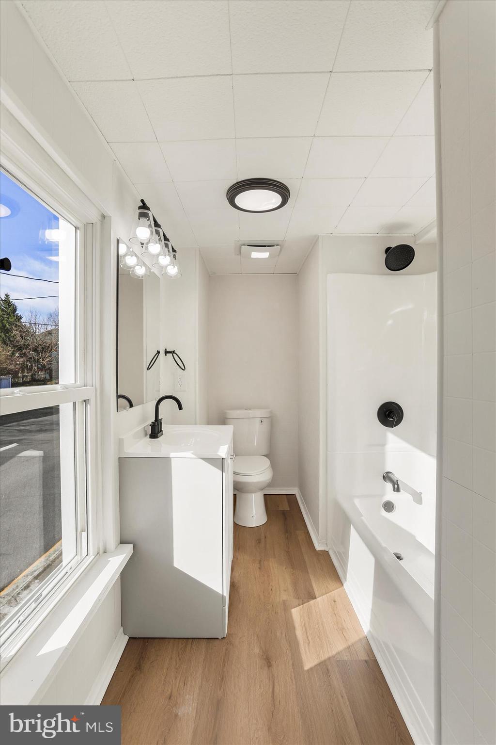 641 South Raleigh Street Martinsburg, WV 25401 - Photo 22 of 34 a bathroom with a sink a toilet and shower