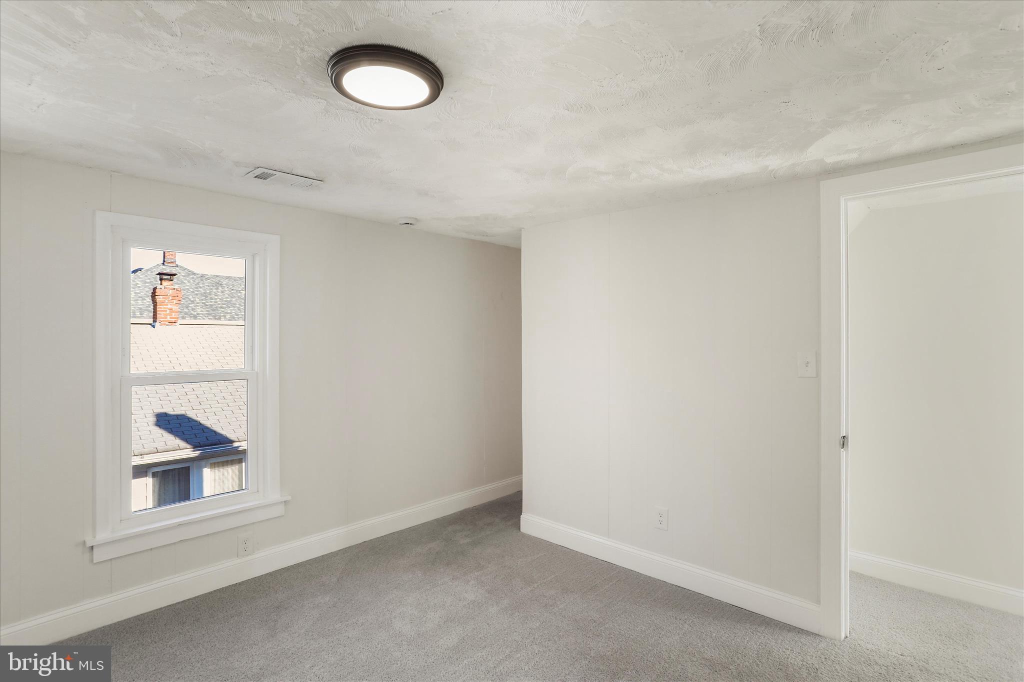 641 South Raleigh Street Martinsburg, WV 25401 - Photo 25 of 34 an empty room with windows and closet