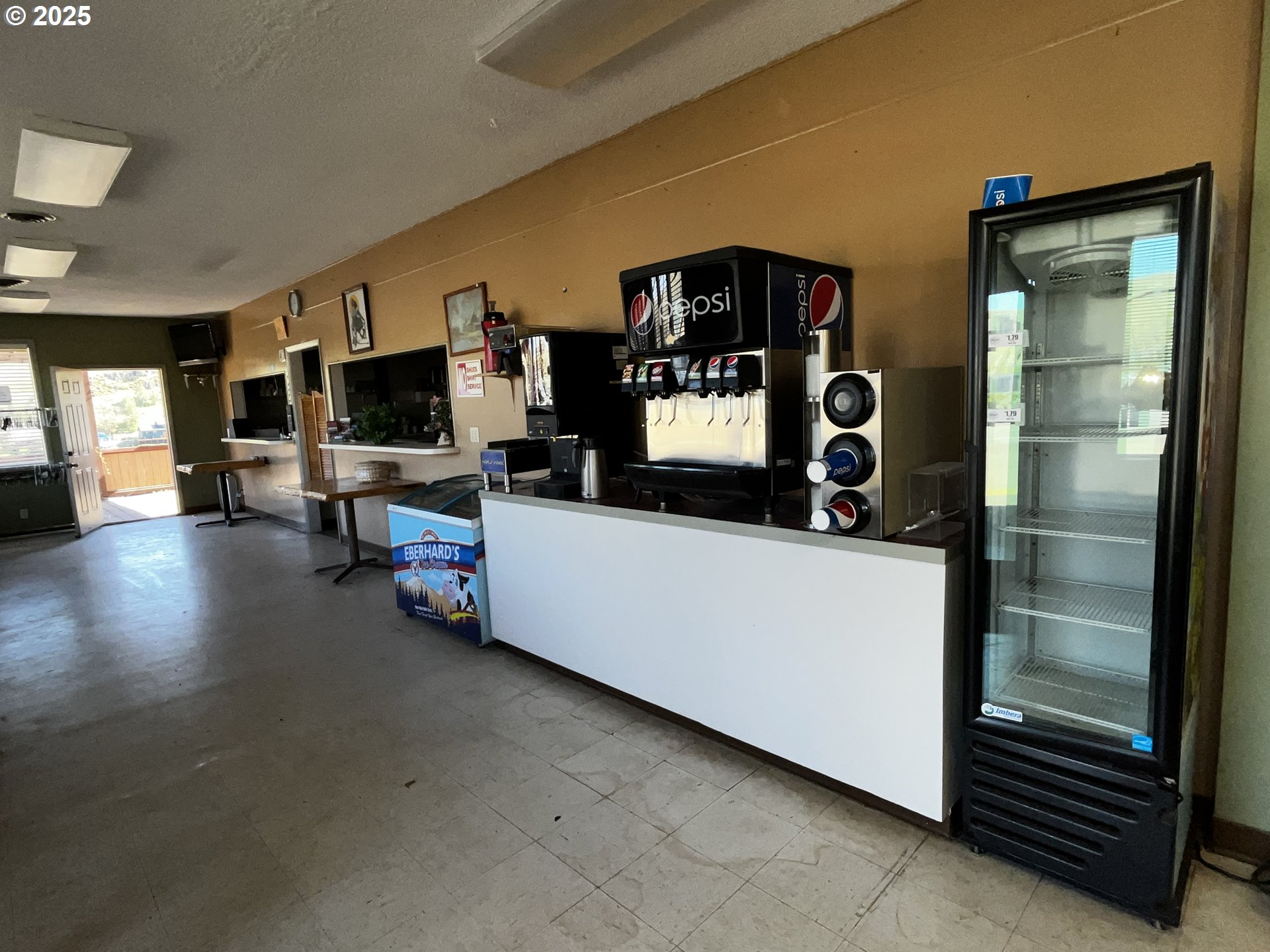 99 3rd Street Maupin, OR 97037 - Photo 14 of 29 a living room with furniture and a flat screen tv