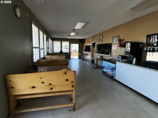 a room with furniture and a flat screen tv
