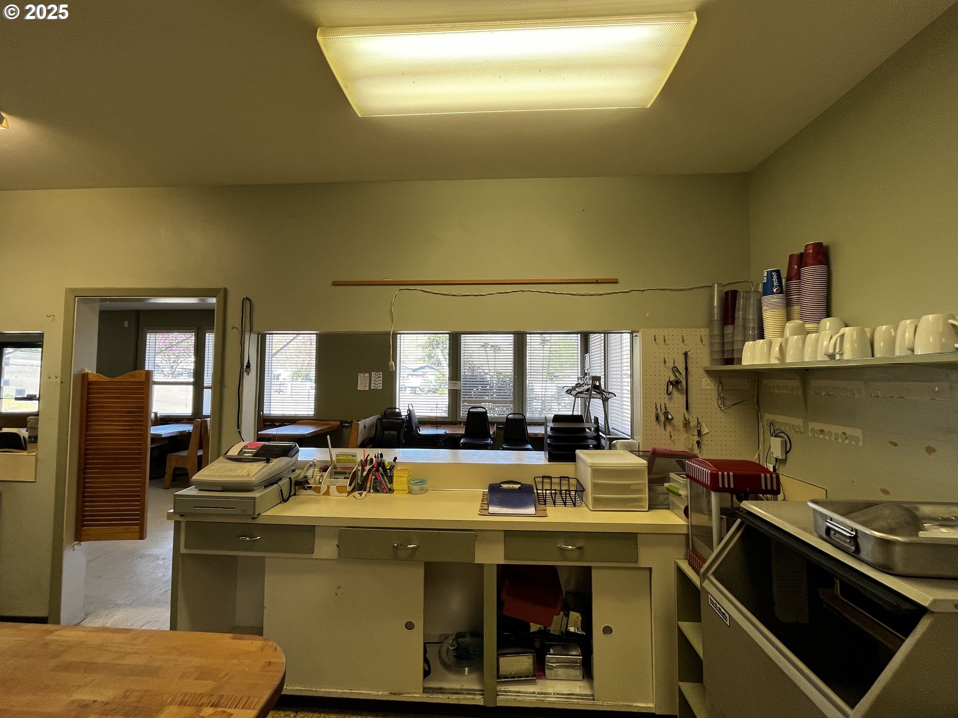 99 3rd Street Maupin, OR 97037 - Photo 28 of 29 a kitchen with a stove a sink and a refrigerator