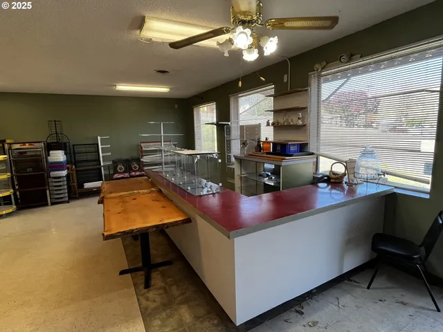 a room with furniture and a large window