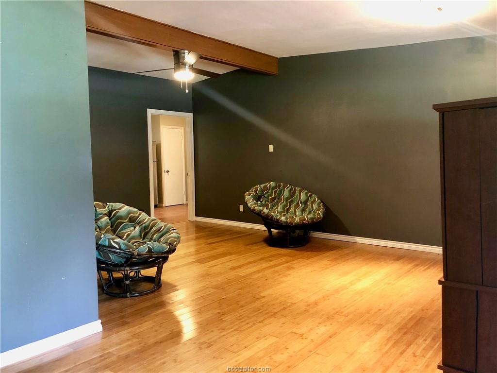 807 Vine Street Bryan, TX 77802 - Photo 3 of 17 a view of a livingroom with wooden floor