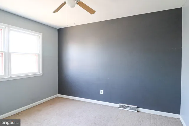 an empty room with a window