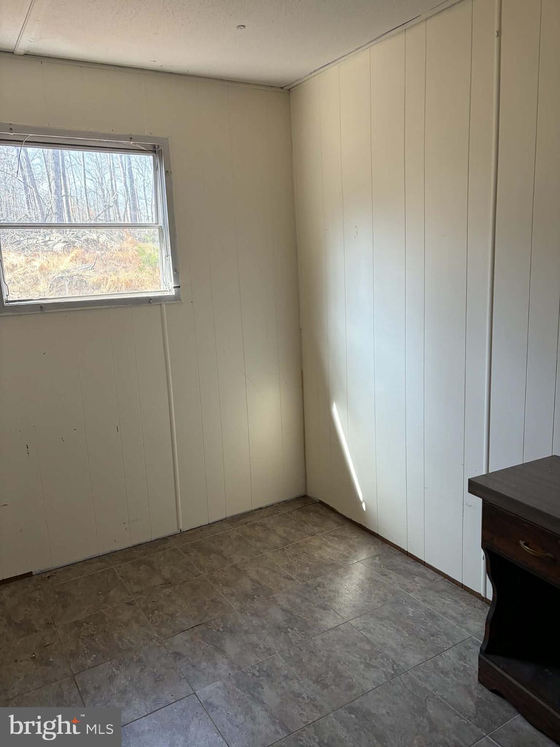6427 Back Creek Road High View, WV 26808 - Photo 7 of 14 an empty room with a window