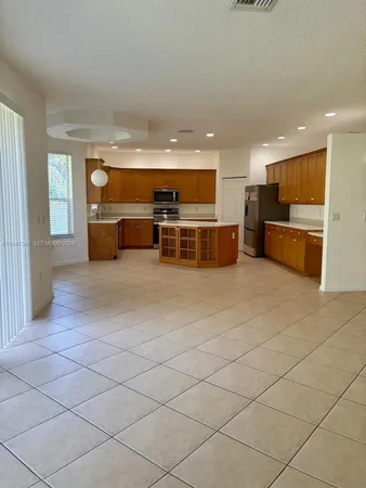 a view of an empty room with stairs