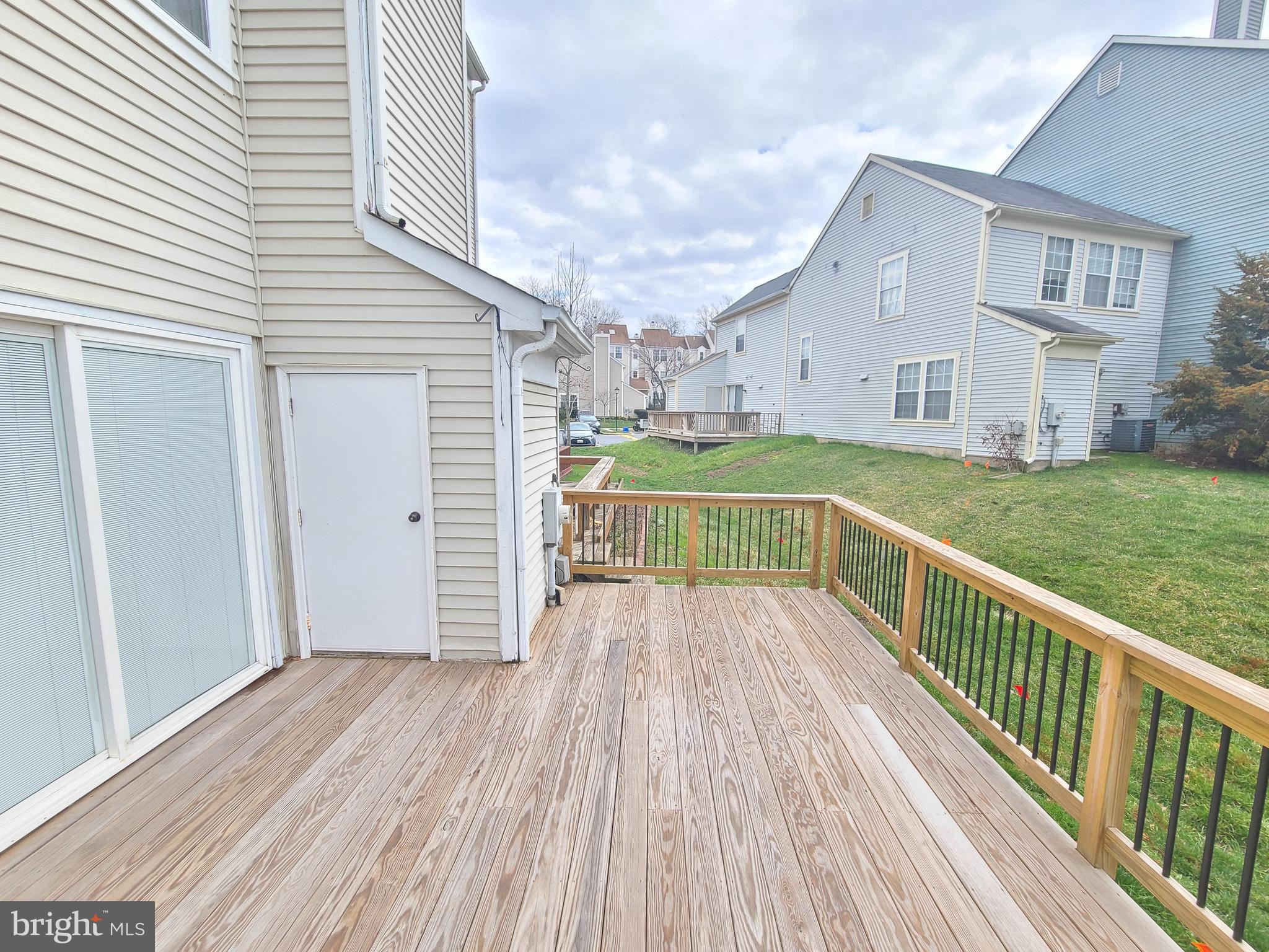 18042 Ohara Circle Olney, MD 20832 - Photo 12 of 35 a view of a house with wooden floor and a yard