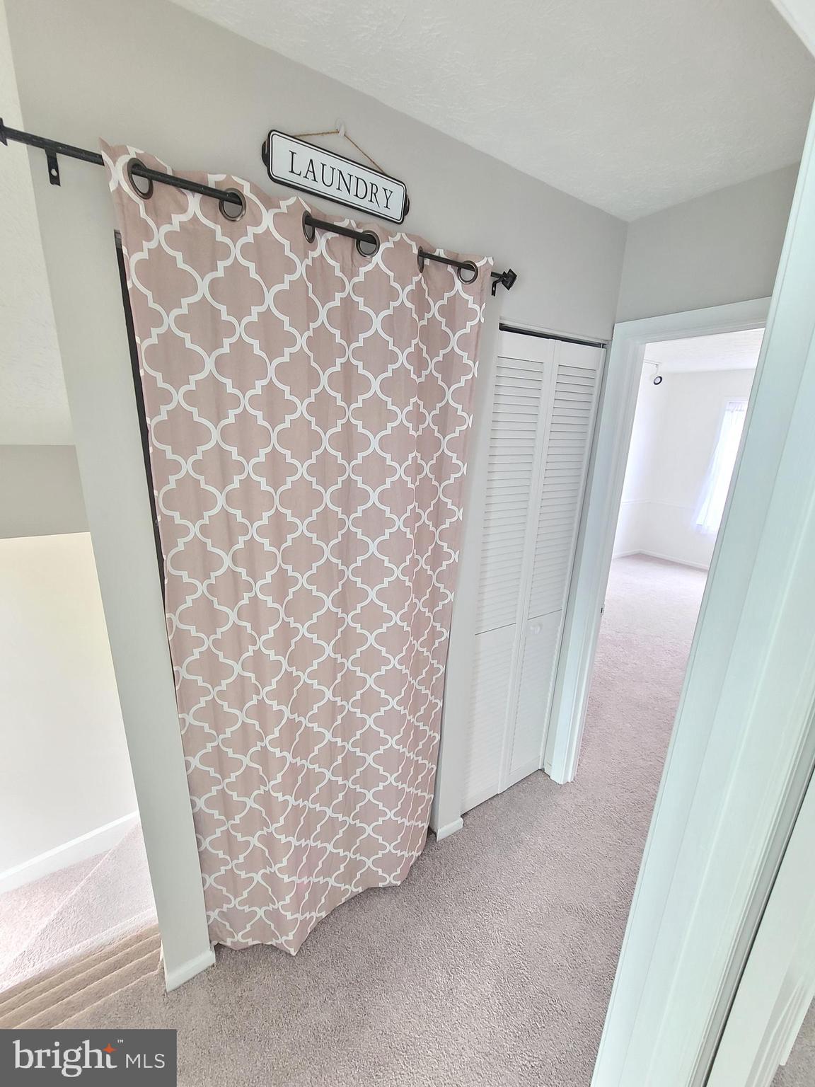 18042 Ohara Circle Olney, MD 20832 - Photo 18 of 35 a view of walk in closet with wooden floor