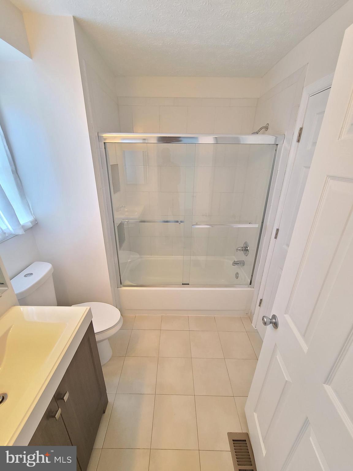 18042 Ohara Circle Olney, MD 20832 - Photo 27 of 35 a bathroom with a toilet and shower