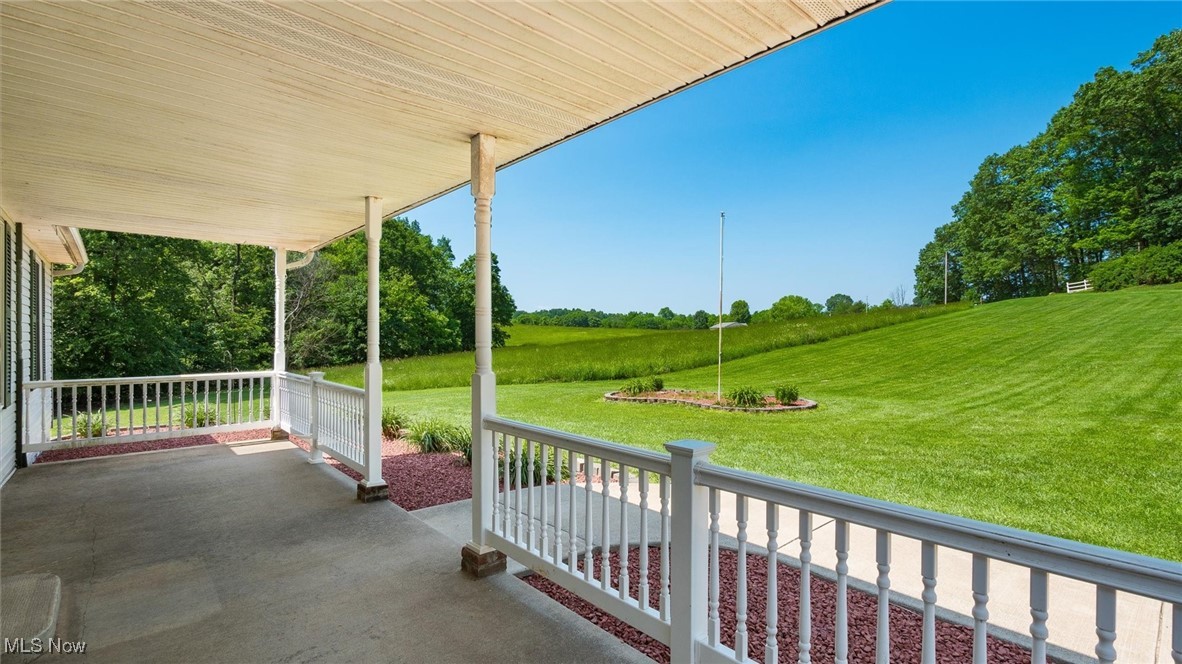 9910 Matchett Road Norwich, OH 43767 - Photo 4 of 48 Porch featuring a lawn