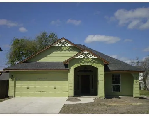 a view of a house with a garage and a garage