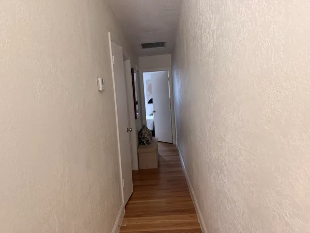 a view of a hallway with a elevator