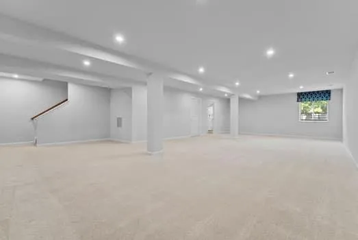 a bathroom with a sink mirror vanity and toilet