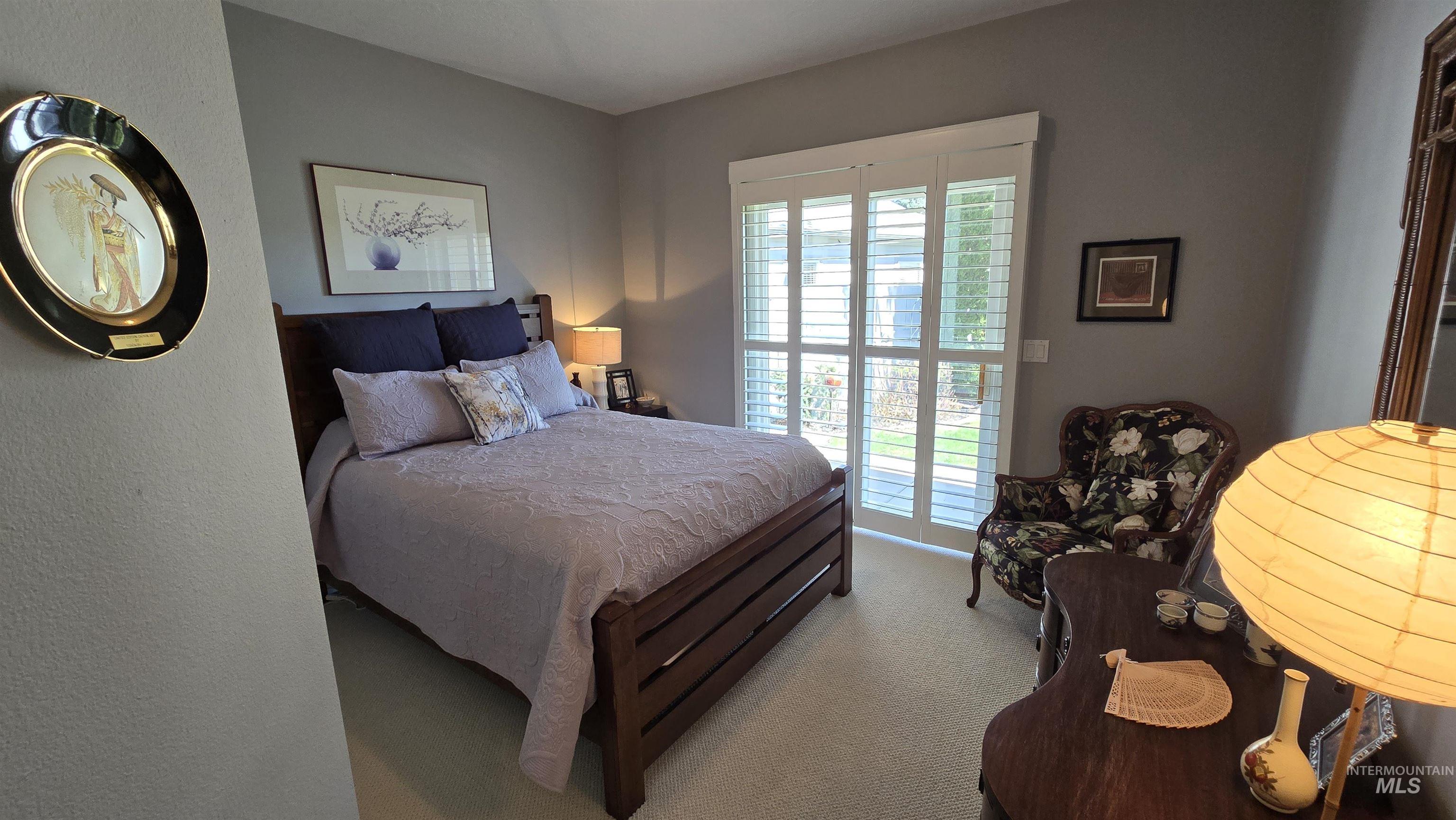 2898 North Silverleaf Way Meridian, ID 83646 - Photo 20 of 26 Bedroom with light colored carpet