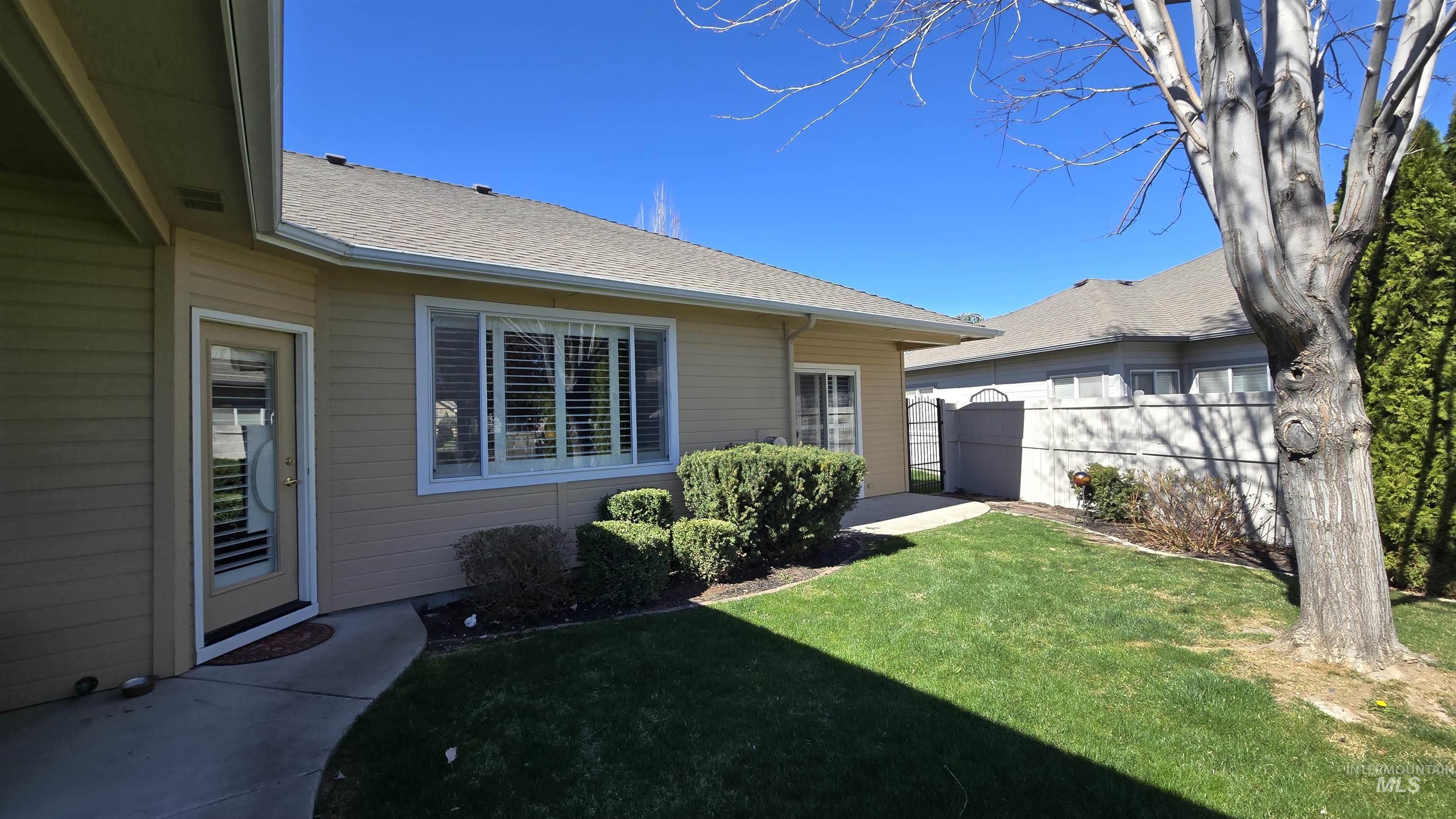 2898 North Silverleaf Way Meridian, ID 83646 - Photo 7 of 26 View of yard featuring a patio area
