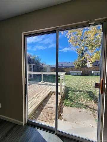 a view of a room with a large window