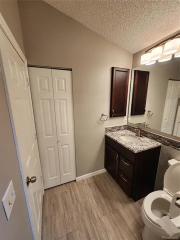 a bathroom with a shower and a glass door