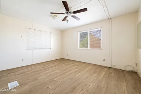 a view of a livingroom with a ceiling fan