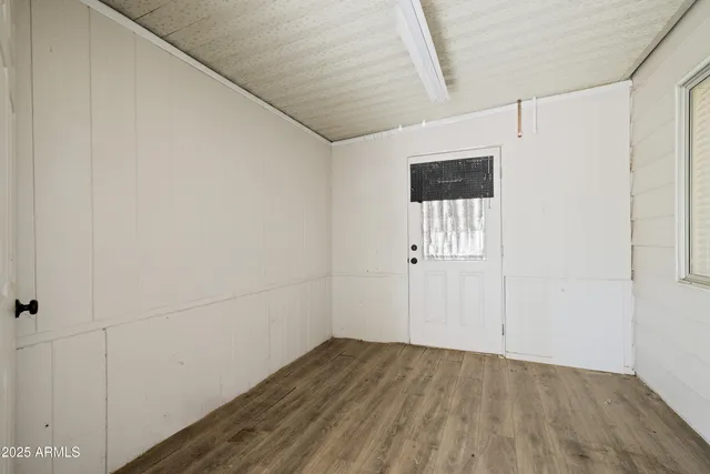 a view of a hallway with closet