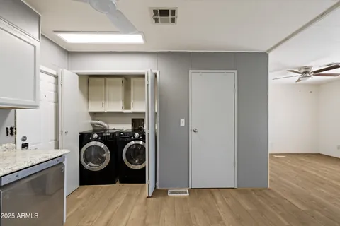 an empty room that has a window in it