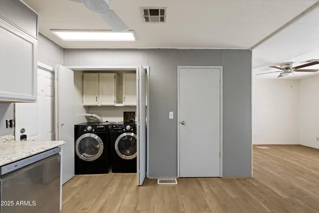 an empty room that has a window in it