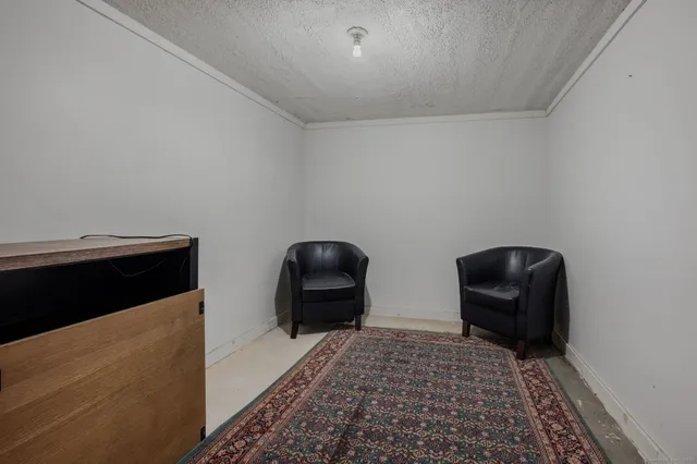 a view of balcony with wooden floor