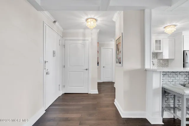 a view of a kitchen from the hallway