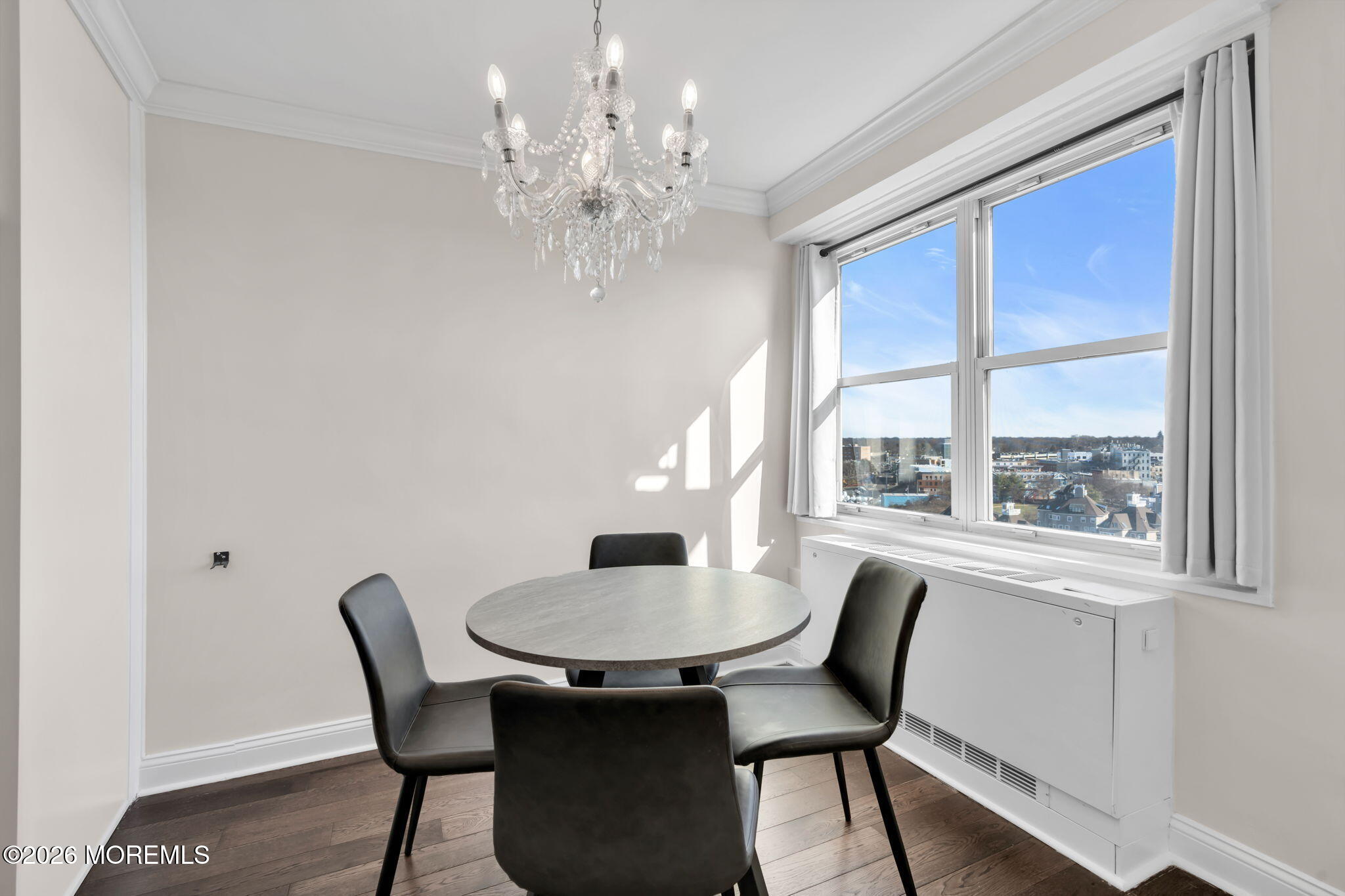 28 Riverside Avenue, Unit 10B Red Bank, NJ 07701 - Photo 10 of 24 a view of a dining room with furniture window and outside view