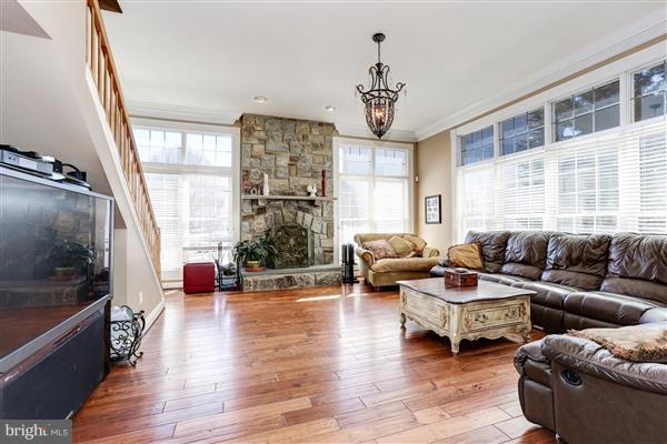 18314 Commandery Way Olney, MD 20832 - Photo 10 of 29 family room with back staircase