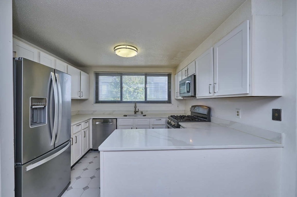 85 Brainerd Road, Unit TH8 Boston, MA 02134 - Photo 5 of 37 Gallery Image 5