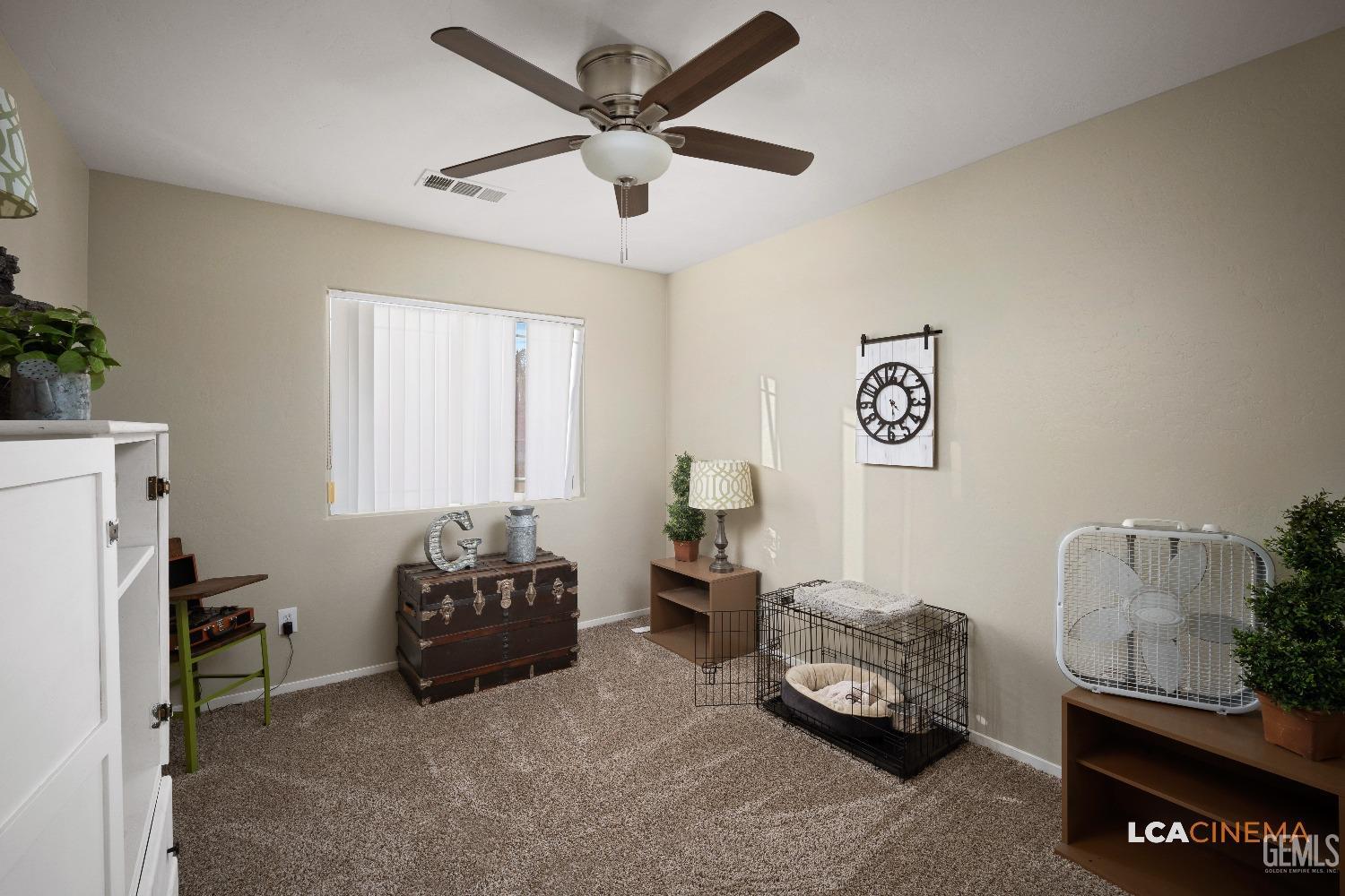 Undisclosed Address Bakersfield, CA 93311 - Photo 17 of 26 a living room with furniture and a window
