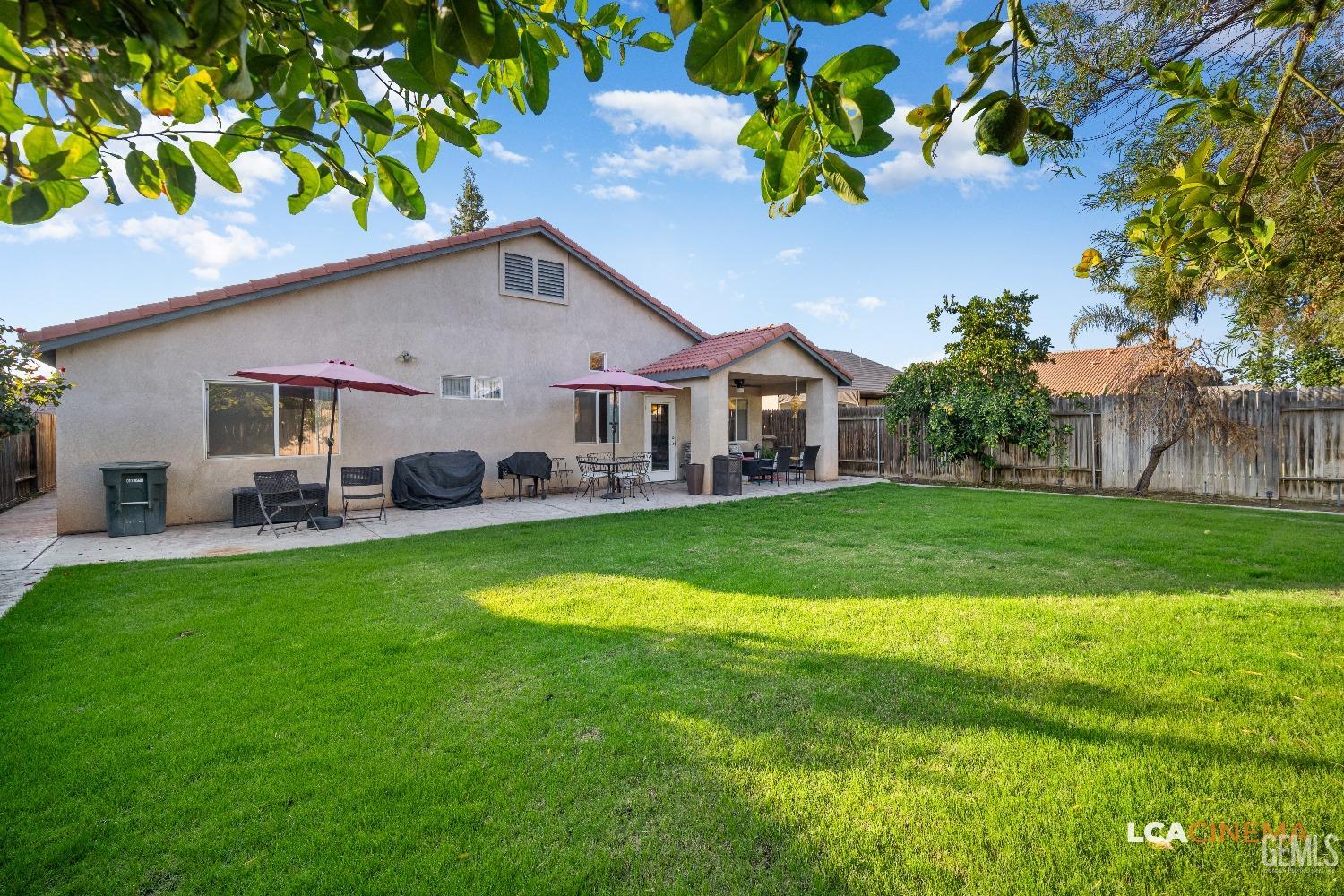 Undisclosed Address Bakersfield, CA 93311 - Photo 21 of 26 a front view of house with yard and green space