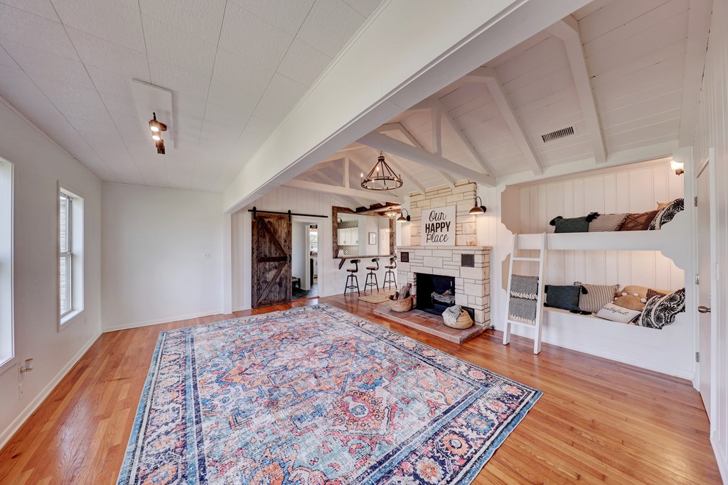 102 Myrtle Avenue Harper, TX 78631 - Photo 20 of 49 a view of a livingroom with fireplace and cabinet