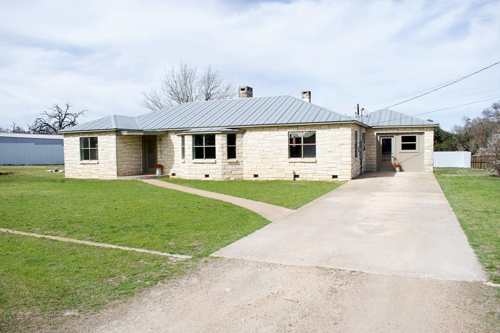 102 Myrtle Avenue Harper, TX 78631 - Photo 3 of 49 a front view of house with yard and green space