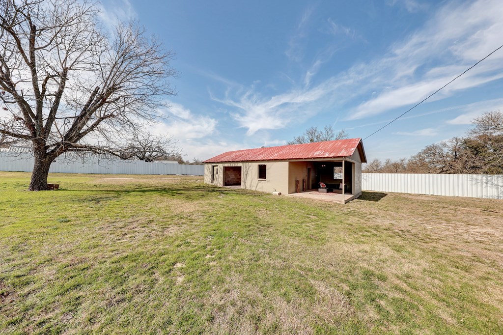 102 Myrtle Avenue Harper, TX 78631 - Photo 48 of 49 a house view with swimming pool in front of it