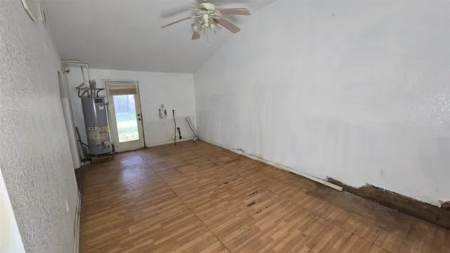 an empty room with a empty space and window