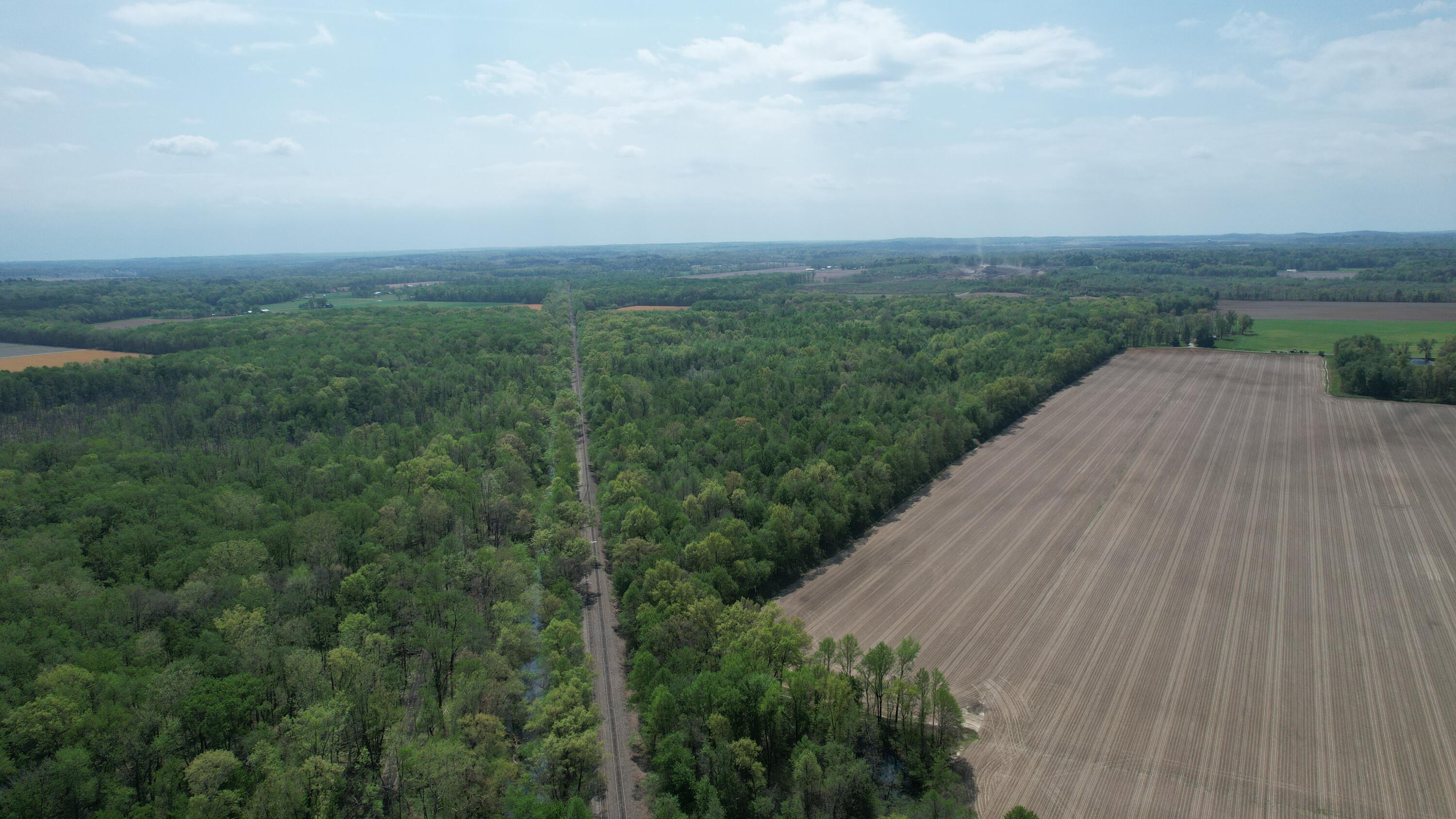 0 West Co Road South Oakland City, IN 47660 - Photo 3 of 10 an aerial view of a house with a yard