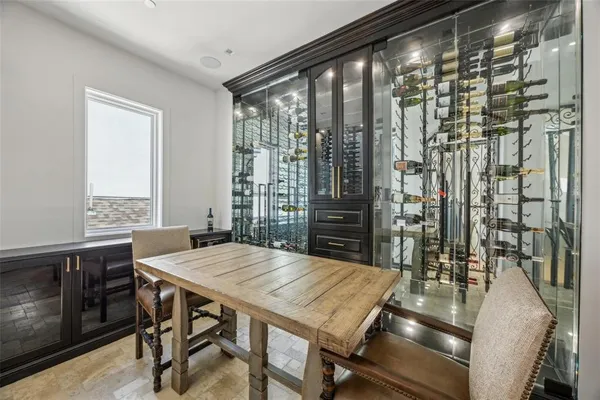 a view of a dining room with furniture and window