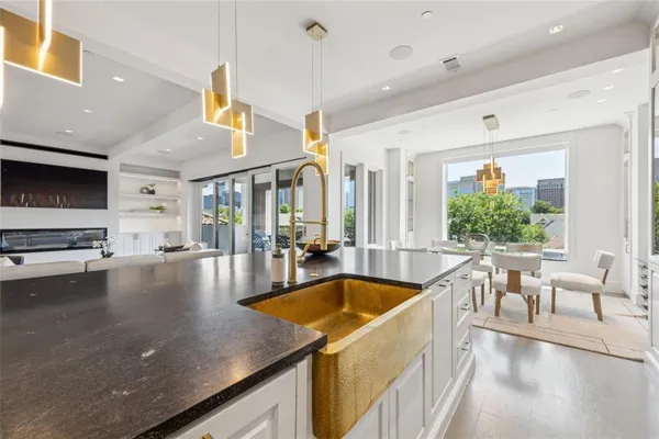 a view of a living room and chandelier