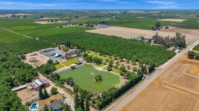 an aerial view of a house with garden