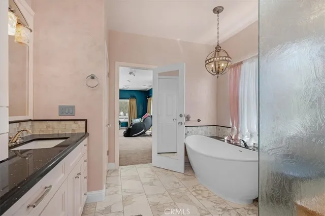 a view of a park with large trees