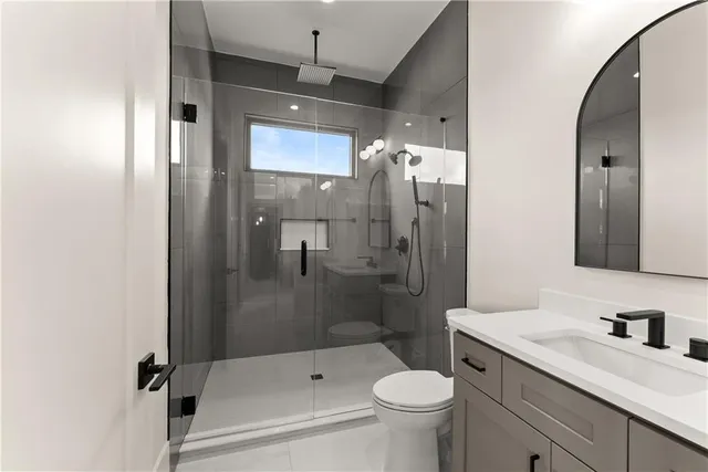 a view of a room with wooden floor and cabinet
